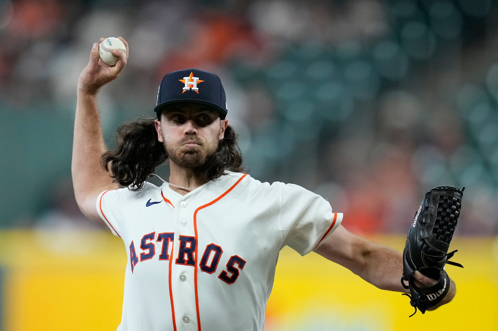 Houston Astros pitcher Spencer Arrighetti delivers during the first inning of a baseball game against the Colorado Rockies, Wednesday, April 15, 2026, in Houston. (AP Photo/Kevin M. Cox)