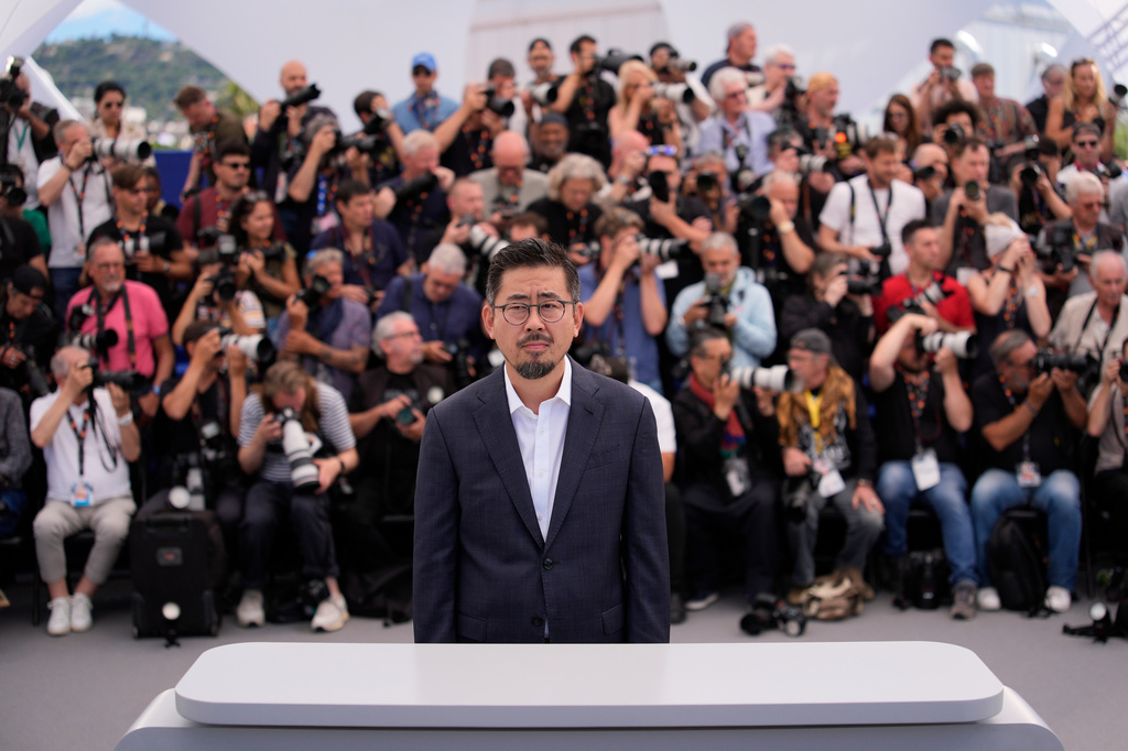 Director Na Hong-jin poses for photographers at the photo call for the film 'Hope' during the 79th international film festival, Cannes, southern France, Monday, May 18, 2026. (AP Photo/John Locher)