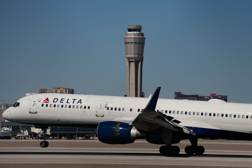 A plane lands at Harry Reid International Airport, Tuesday, Oct. 7, 2025, in Las Vegas. (AP Photo/John Locher) A plane lands at Harry Reid International Airport, Tuesday, Oct. 7, 2025, in Las Vegas. (AP Photo/John Locher)