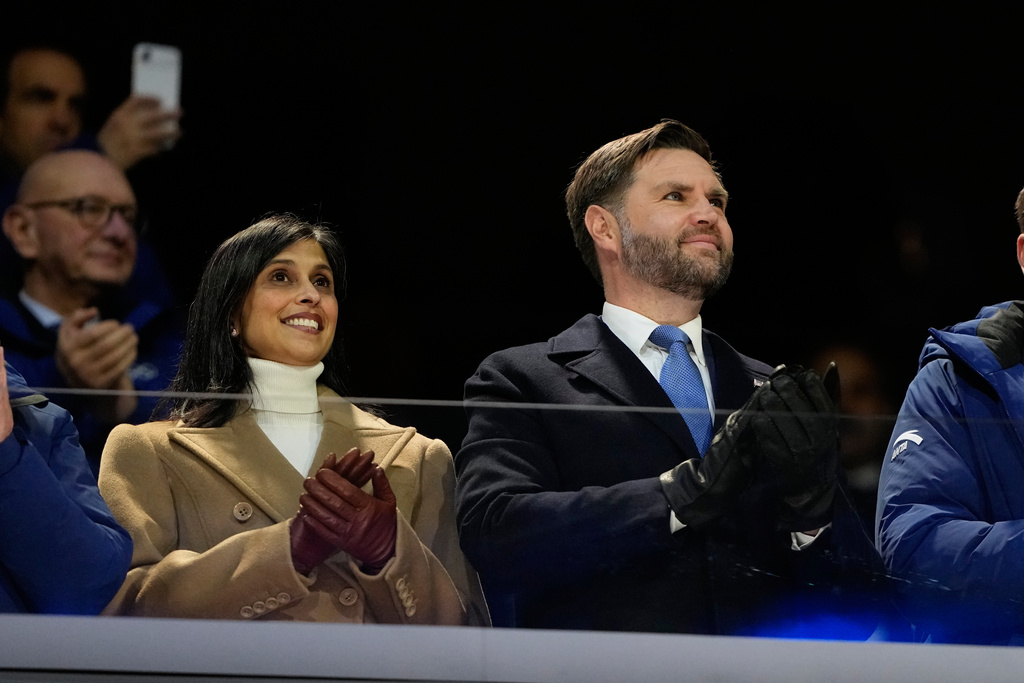 JD Vance and his wife Usha applaud at the start of the Olympic opening ceremony at the 2026 Winter Olympics, in Milan, Italy, Friday, Feb. 6, 2026. (AP Photo/Natacha Pisarenko)