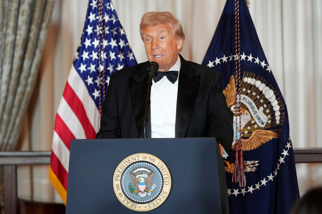 President Donald Trump speaks at a Kennedy Center Honors reception for recipients Sylvester Stallone, George Strait, Kiss, Gloria Gaynor and Michael Crawford at the State Department, Saturday, Dec. 6, 2025, in Washington. (AP Photo/Julia Demaree Nikhinson)