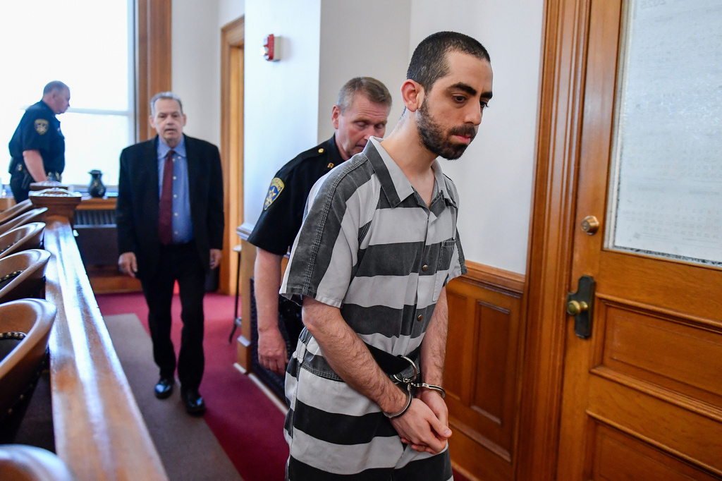FILE - Hadi Matar walks in to the Chautauqua County court in Mayville, N.Y., May, 16, 2025. (AP Photo/Adrian Kraus, File)