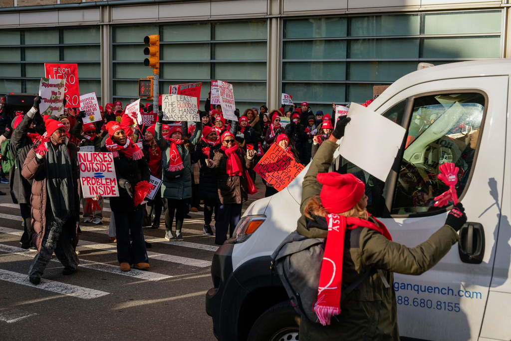 Nurses strike outside New York-Presbyterian Hospital, Monday, Jan. 12, 2026, in New York. (AP Photo/Yuki Iwamura)