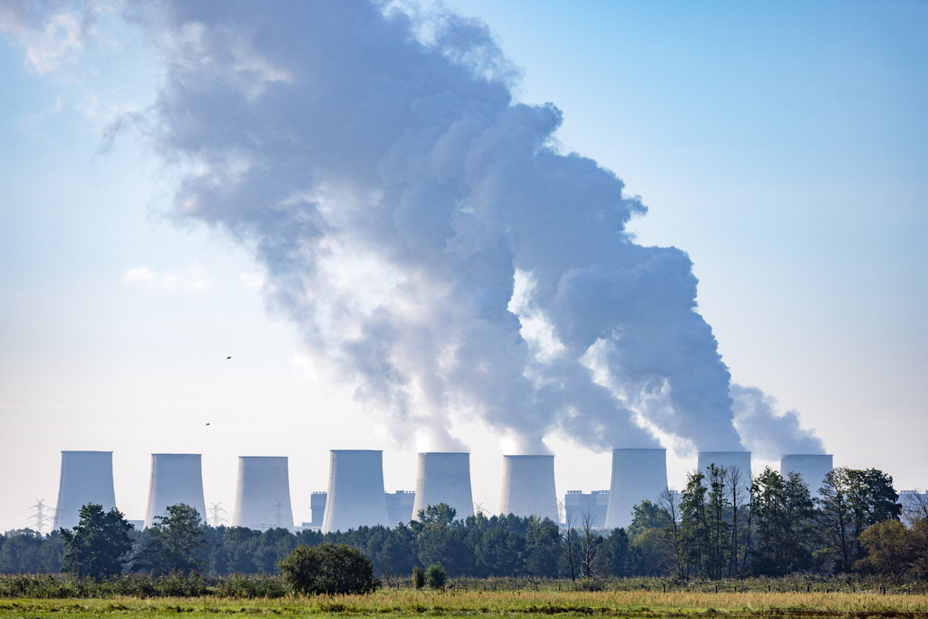 Water vapor rises from the cooling towers at the Jänschwalde power plant in Turnow-Preilack, Germany, Wednesday, Sept. 2, 2026. (Frank Hammerschmidt/dpa via AP)
