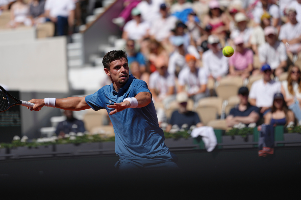 Arthur Gea of France returns to Karen Khachanov of Russia during the first round men's singles tennis match at the French Open tennis tournament in Paris, Sunday, May 24, 2026. (AP Photo/Aurelien Morissard)