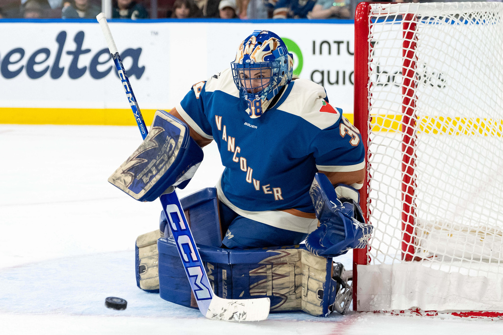 Vancouver Goldeneyes goaltender Emerance Maschmeyer (38) prepares to make a save against the Seattle Torrent during the second period of a PWHL hockey game in Vancouver, on Tuesday, April 14, 2026. (Ethan Cairns/The Canadian Press via AP)