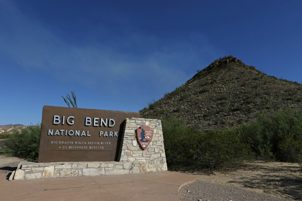 FILE - A Big Bend National Park sign at the west side entrance near Maverick Junction, May 24, 2019, in Big Bend National Park in Texas. (Jacob Ford/Odessa American via AP)