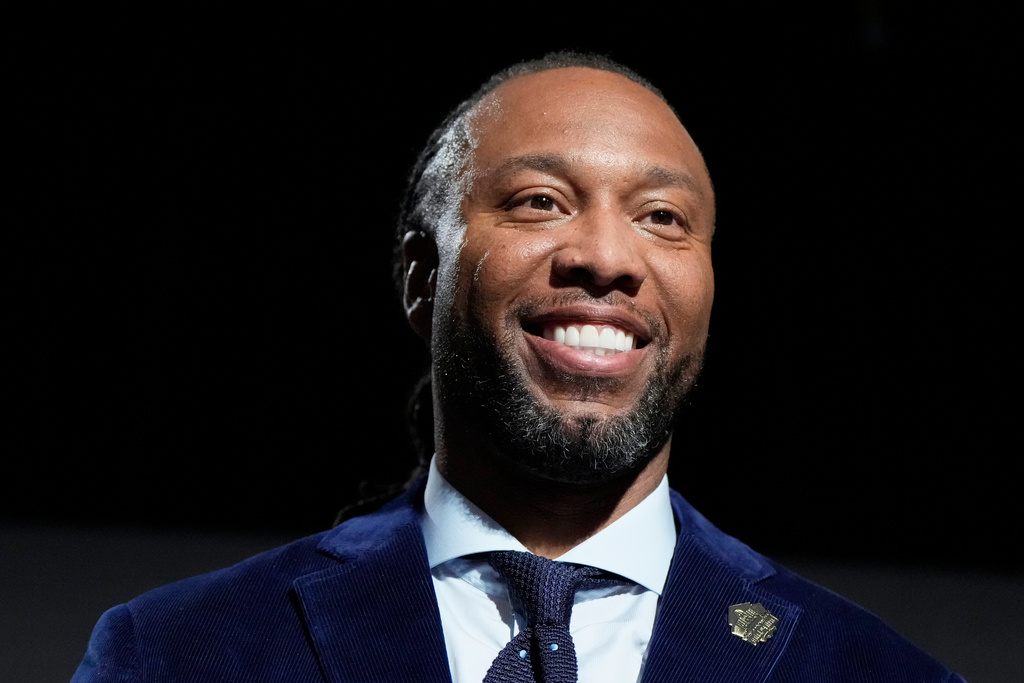 Larry Fitzgerald smiles after being announced for the Pro Football Hall of Fame class of 2026 during football's NFL Honors award show in San Francisco, Thursday, Feb. 5, 2026. (AP Photo/Brynn Anderson)