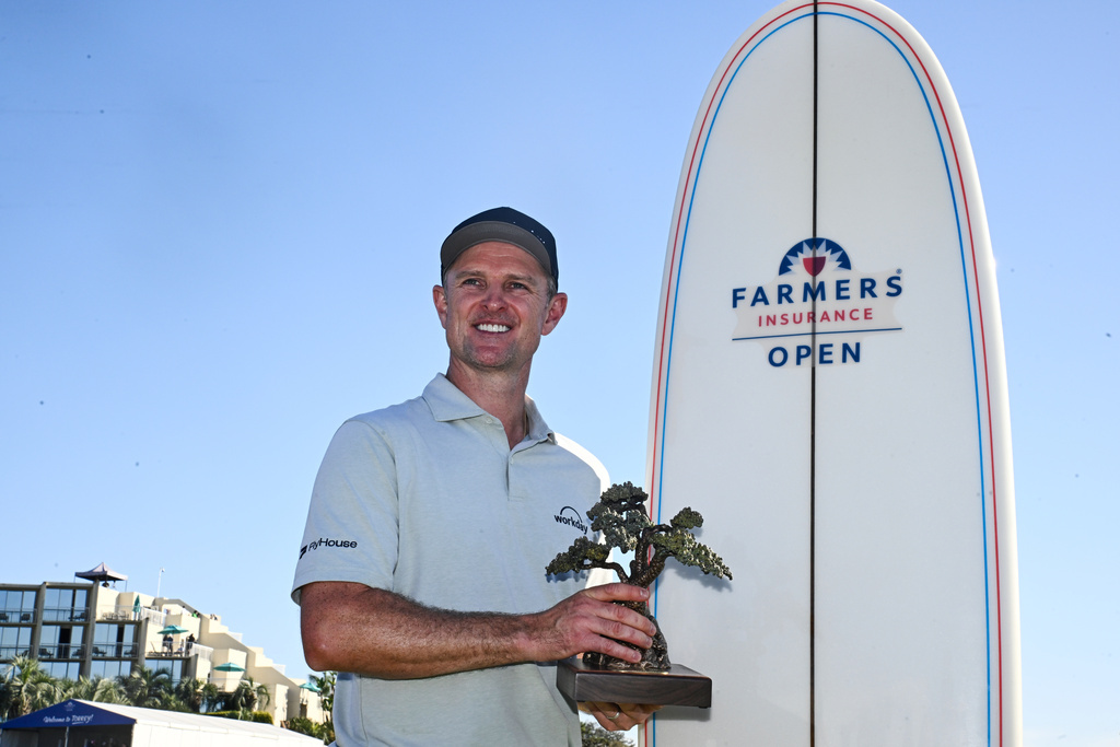 Rose gets another win at Torrey Pines . This was one special with his longtime caddie at his side