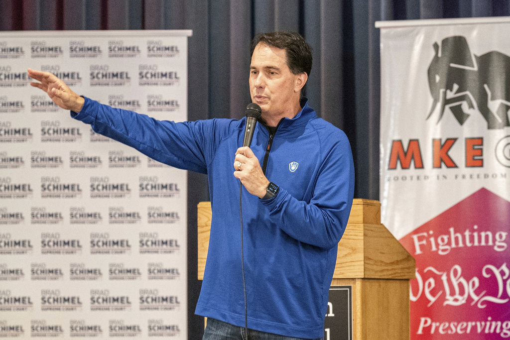 FILE - Former Wisconsin Gov. Scott Walker addresses a crowd at a campaign rally for Wisconsin Supreme Court candidate Brad Schimel, March 29, 2025, in Milwaukee. (AP Photo/Andy Manis, File)