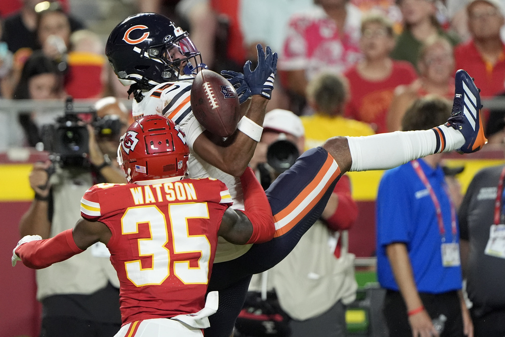 Chicago Bears wide receiver Rome Odunze is unable to catch a pass as Kansas City Chiefs cornerback Jaylen Watson (35) defends during the first half of a preseason NFL football game Friday, Aug. 22, 2025, in Kansas City, Mo. (AP Photo/Charlie Riedel)