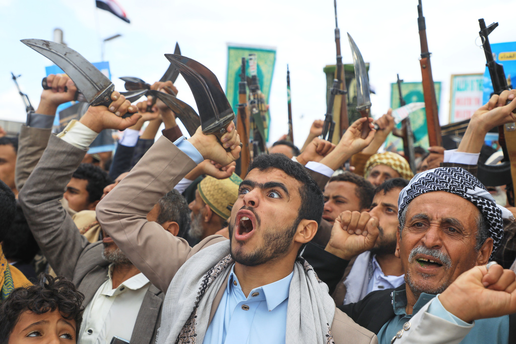 Supporters of Yemen's Houthi rebels shout slogans during a rally in support of the group and to protest Saudi Arabia's accusation that the Houthis targeted Islam's holiest site, Mecca, in Sanaa, Yemen, Friday, Sept. 18, 2026. (AP Photo/Osamah Abdulrahman)