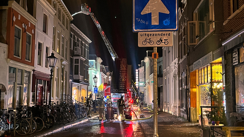Firefighters extinguish the fire at the scene of an explosion in Utrecht, Netherlands, Thursday, Jan. 15, 2026. (AP Photo/Ahmad Seir)