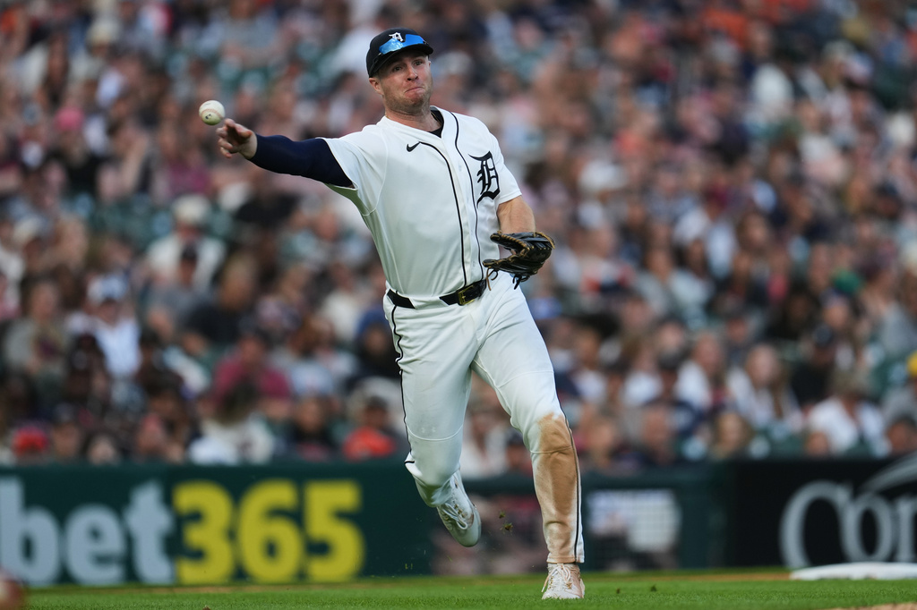 Detroit Tigers third baseman Colt Keith throws to first base for an out against the Los Angeles Angels during the fifth inning of a baseball game Wednesday, May 27, 2026, in Detroit. (AP Photo/Paul Sancya)
