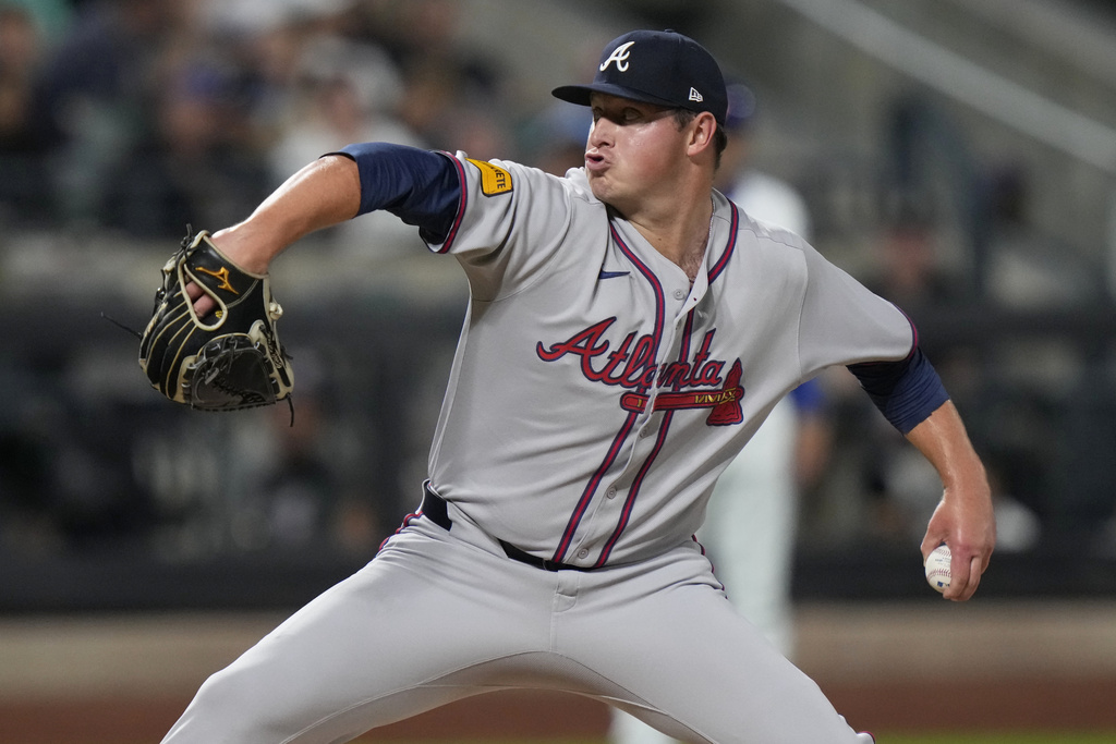 Atlanta Braves' Austin Cox pitches during the fifth inning of a baseball game against the New York Mets Tuesday, Aug. 12, 2025, in New York. (AP Photo/Frank Franklin II)