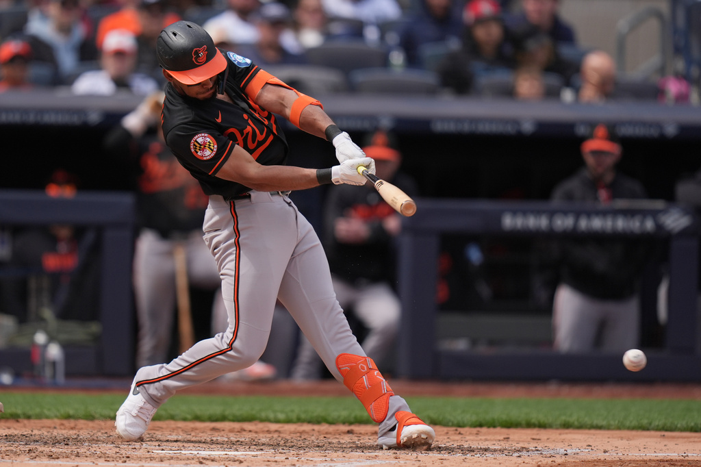 Baltimore Orioles' Jeremiah Jackson hits into a double play but still scores a run during the fourth inning of a baseball game against the New York Yankees, Sunday, May 3, 2026, in New York. (AP Photo/Seth Wenig)