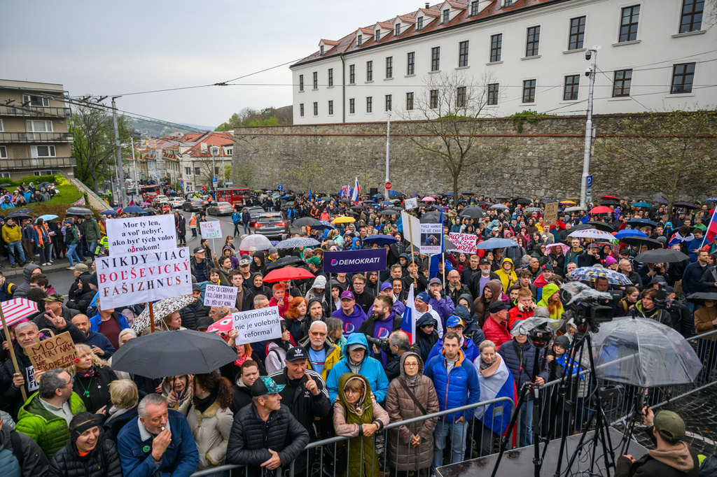 People attend a protest organised by Progressive Slovakia in front of Parliament in Bratislava, Slovakia, Tuesday, April 14, 2026. (Jaroslav Novak/TASR via AP)