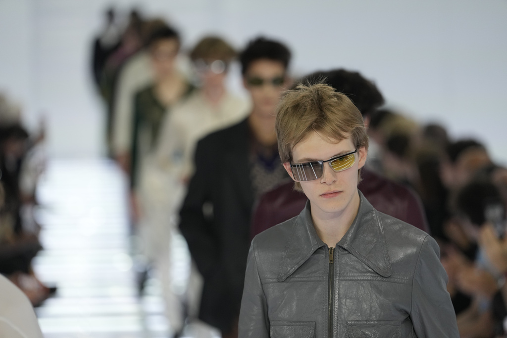 A model wears a creation from Prada's Spring/Summer 2027 men's collection presented in Milan, Italy, Sunday, June 21, 2026. (AP Photo/Luca Bruno)