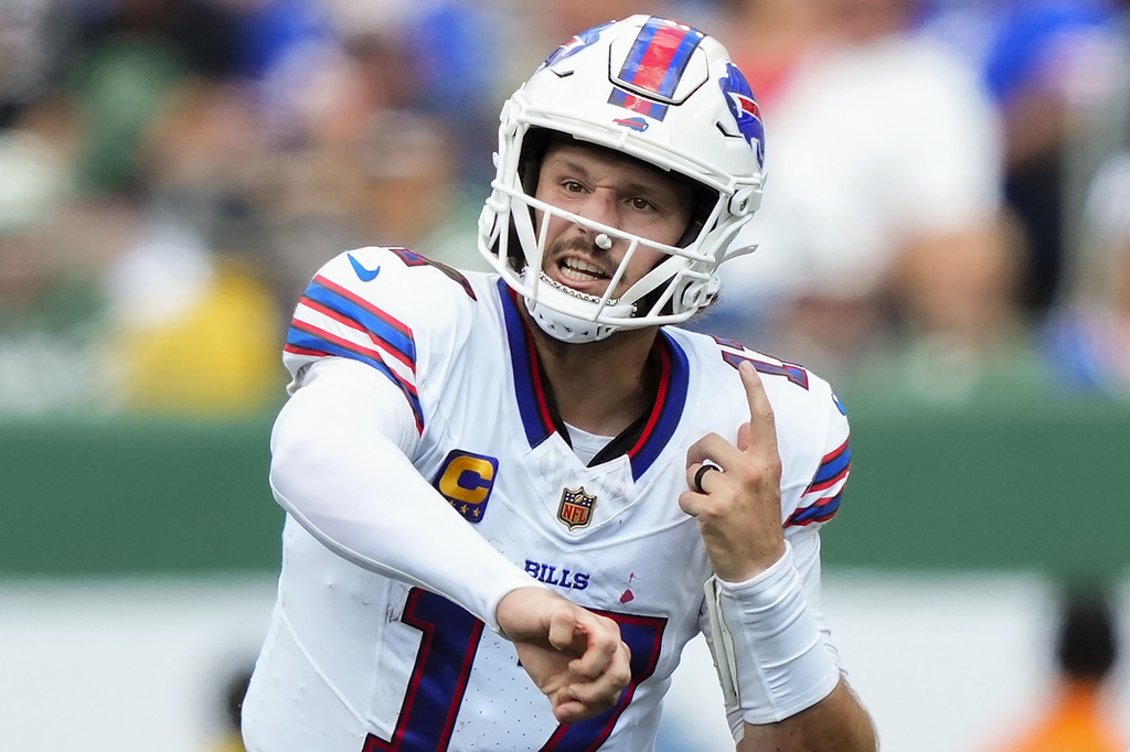 Buffalo Bills quarterback Josh Allen (17) passes against the New York Jets during the second quarter of an NFL football game, Sunday, Sept. 14, 2025, in East Rutherford, N.J. (AP Photo/Yuki Iwamura)