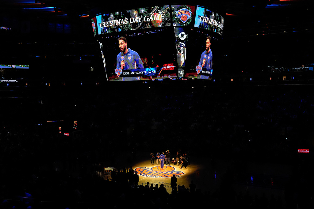 New York Knicks center Karl-Anthony Towns (32) speaks before an NBA basketball game between the New York Knicks and the Cleveland Cavaliers, Thursday, Dec. 25, 2025, in New York. (AP Photo/Yuki Iwamura)
