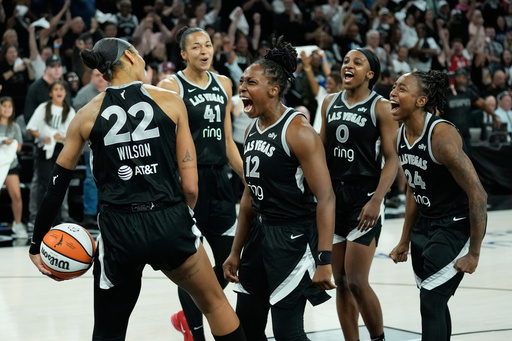 Las Vegas Aces players celebrate after defeating the Indiana Fever in Game 5 of a WNBA basketball playoff semifinals series Tuesday, Sept. 30, 2025, in Las Vegas. (AP Photo/John Locher) Las Vegas Aces players celebrate after defeating the Indiana Fever in Game 5 of a WNBA basketball playoff semifinals series Tuesday, Sept. 30, 2025, in Las Vegas. (AP Photo/John Locher)