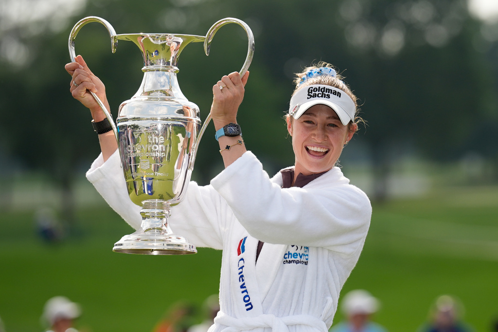 Nelly Korda holds the trophy after winning the Chevron Championship LPGA golf tournament Sunday, April 26, 2026, in Houston. (AP Photo/David J. Phillip)