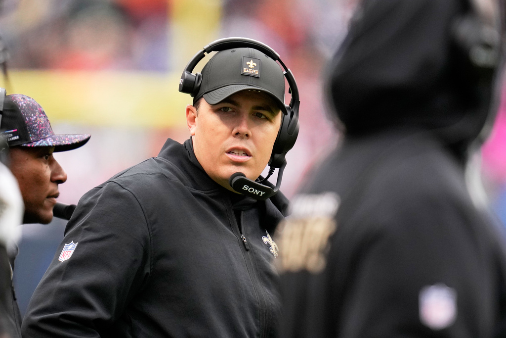New Orleans Saints head coach Kellen Moore watches from the sideline in the first half of an NFL football game against the Chicago Bears, Sunday, Oct. 19, 2025, in Chicago. (AP Photo/Erin Hooley)