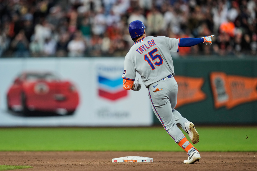 New York Mets' Tyrone Taylor runs the bases after hitting a three-run home run during the fifth inning of a baseball game against the San Francisco Giants, Saturday, April 4, 2026, in San Francisco. (AP Photo/Godofredo A. Vásquez)