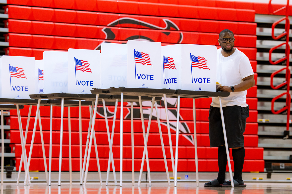 A person votes in the primary election at Oak Park High School in Oak Park, Mich., Tuesday, Aug. 4, 2026. (AP Photo/Nic Antaya)