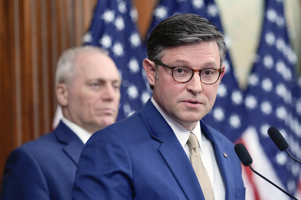 Speaker of the House Mike Johnson, R-La., speaks as House Majority Leader Steve Scalise, R-La., left, looks on during a news conference on day 34 of the government shutdown, on Capitol Hill, Monday, Nov. 3, 2025, in Washington. (AP Photo/Mariam Zuhaib)