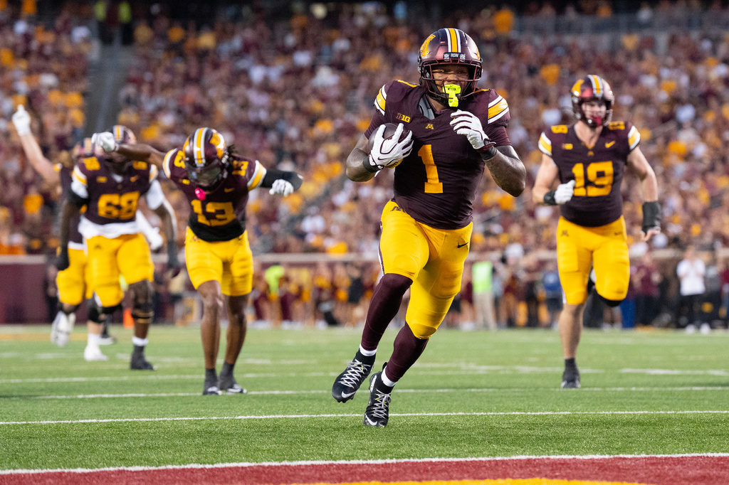 Minnesota Gophers running back Darius Taylor (1) runs in a touchdown against Eastern Illinois Panthers in the second quarter of an NCAA college football game, in Minneapolis, Minn. on Thursday, Sep. 3, 2026. (Alex Kormann/Minnesota Star Tribune via AP)
