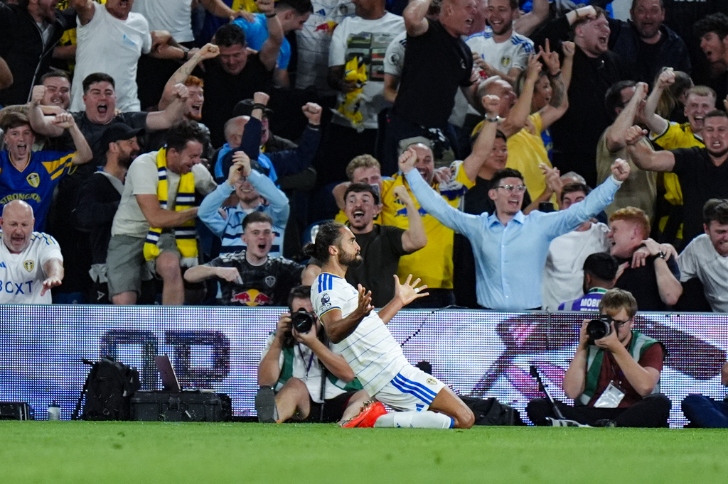 Leeds United's Dominic Calvert-Lewin celebrates scoring during the English Premier League soccer match between Leeds United and Newcastle United in Leeds, England, Monday Sept. 14, 2026. (Annabel Lee-Ellis/PA via AP)
