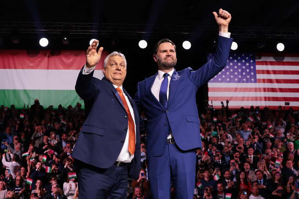 U.S. Vice President JD Vance and Hungarian Prime Minister Viktor Orban, left, wave to the audience during a Day of Friendship event in Budapest, Hungary Tuesday, April 7, 2026. (Jonathan Ernst/Pool Photo via AP)