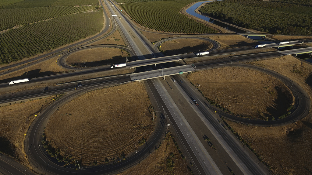 Freight trucks travel northbound on Interstate 5 Highway, Wednesday, Sept. 3, 2025, in Tracy, Calif. (AP Photo/Godofredo A. Vásquez)