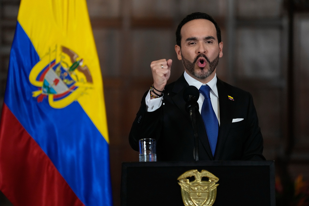 Colombia's President Abelardo De la Espriella announces a joint effort with Bogota's Mayor Carlos Fernando Galan to strengthen security in the Colombian capital through increased police presence, intelligence, technology, and urban capabilities in Bogota, Tuesday, Aug. 25, 2026. (AP Photo/Fernando Vergara)
