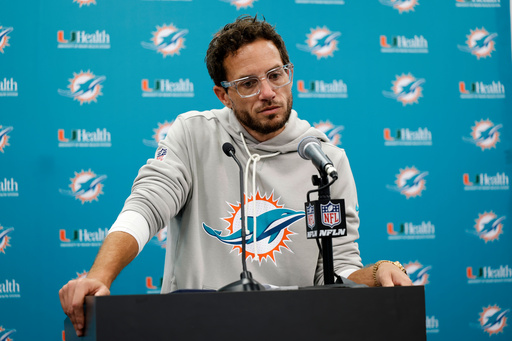 Miami Dolphins head coach Mike McDaniel speaks during a news conference after an NFL football game against the Carolina Panthers, Sunday, Oct. 5, 2025, in Charlotte, N.C. (AP Photo/Rusty Jones) Miami Dolphins head coach Mike McDaniel speaks during a news conference after an NFL football game against the Carolina Panthers, Sunday, Oct. 5, 2025, in Charlotte, N.C. (AP Photo/Rusty Jones)