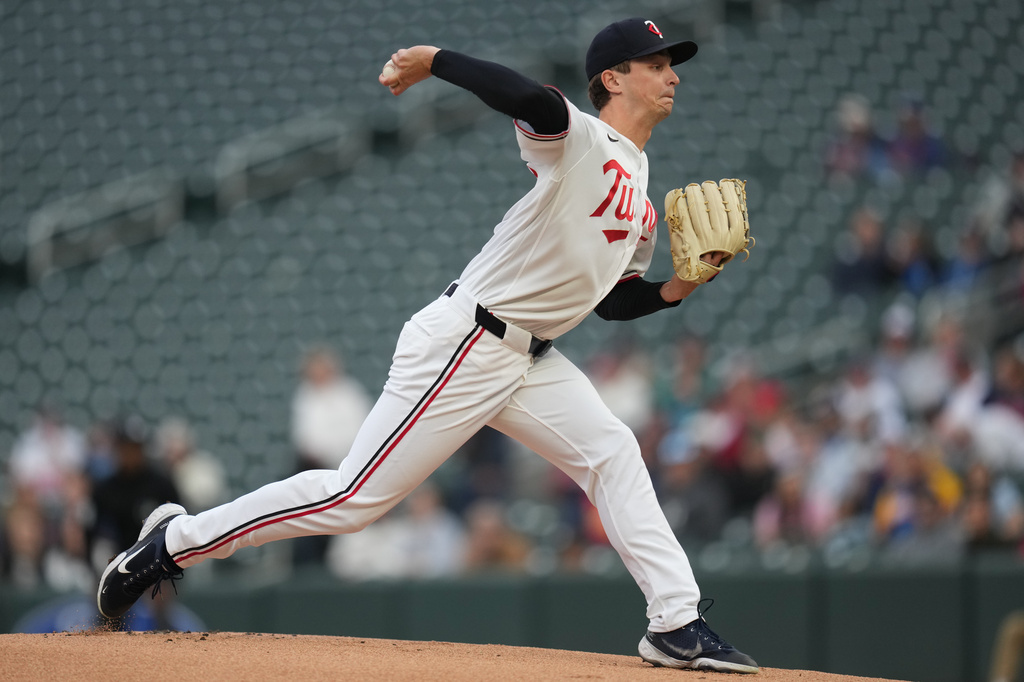 Minnesota Twins starting pitcher Mick Abel (20) delivers during the first inning of a baseball game against the Boston Red Sox Tuesday, April 14, 2026, in Minneapolis. (AP Photo/Abbie Parr)