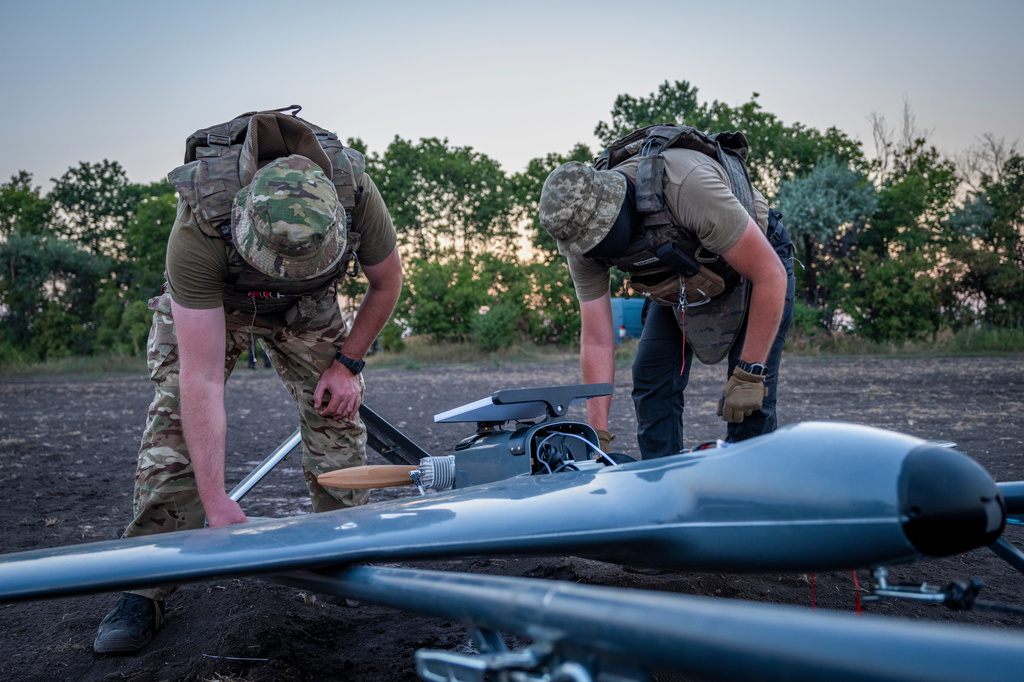 Ukrainian servicemen prepare a "Chaklun" strike drone used for deep-strike operations against Russian positions in Crimea, in an undisclosed location in Ukraine on Thursday, Aug. 6, 2026. (AP Photo/Dan Bashakov)