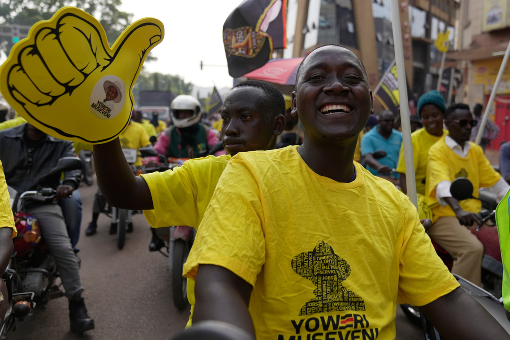 Supporters of Ugandan President Yoweri Museveni celebrate his victory in the presidential election in Kampala, Uganda, Saturday, Jan. 17, 2026. (AP Photo/Brian Inganga)
