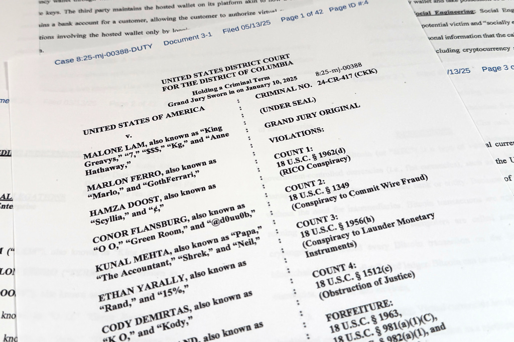 This Justice Department grand jury superseding indictment against Malone Lam and his co-defendants is photographed Friday, Sept. 4, 2026. (AP Photo/Jon Elswick)