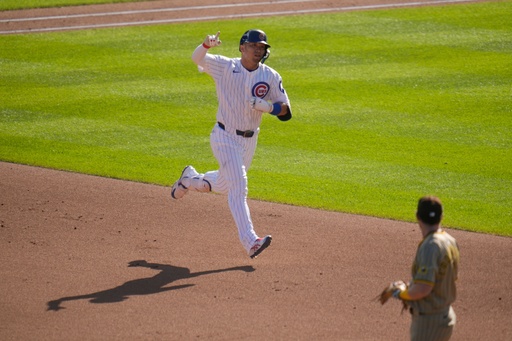 Chicago Cubs' Seiya Suzuki hits a home run during the fifth inning of Game 1 of a National League wild card baseball game against the San Diego Padres Tuesday, Sept. 30, 2025, in Chicago. (AP Photo/Erin Hooley) Chicago Cubs' Seiya Suzuki hits a home run during the fifth inning of Game 1 of a National League wild card baseball game against the San Diego Padres Tuesday, Sept. 30, 2025, in Chicago. (AP Photo/Erin Hooley)