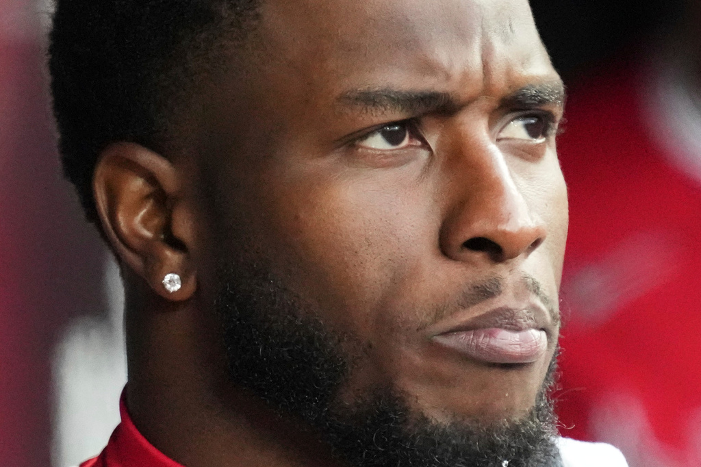 FILE - Tim Anderson, with Los Angeles Angels, looks to the field during the ninth inning of an opening-day baseball game against the Chicago White Sox in Chicago, March 27, 2025. (AP Photo/Nam Y. Huh, File)
