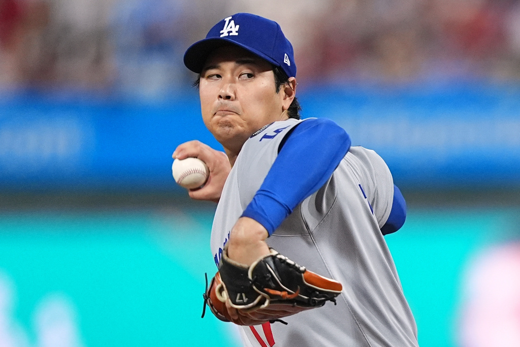 Los Angeles Dodgers' Shohei Ohtani pitches during the second inning in Game 1 of baseball's National League Division Series against the against the Philadelphia Phillies Saturday, Oct. 4, 2025, in Philadelphia. (AP Photo/Matt Rourke)