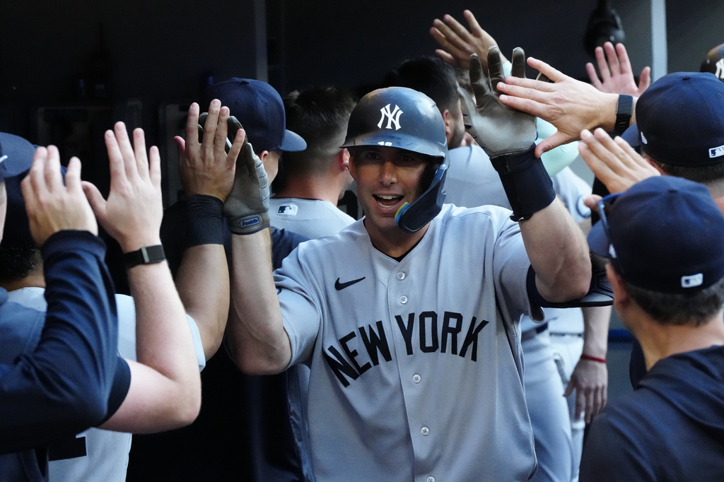 New York Yankees' Paul Goldschmidt celebrates with teammates after hitting a two-run home run against the Toronto Blue Jays during the ninth inning of a baseball game in Toronto, Saturday, June 13, 2026. (Frank Gunn/The Canadian Press via AP)