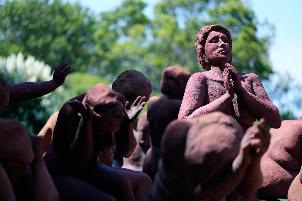 A sculpture titled "Dark Elegy" is displayed in the backyard of artist Suse Lowenstein, whose son, Alex, was killed in the bombing of Pan Am Flight 103 over Lockerbie, Scotland, in Montauk, N.Y., Wednesday, Aug. 19, 2026. (AP Photo/Seth Wenig)