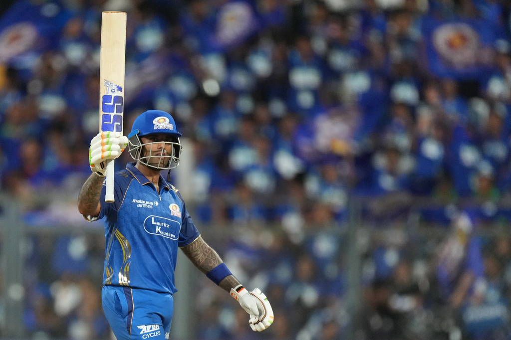Mumbai Indians' Suryakumar Yadav celebrates his fifty runs during the Indian Premier League cricket match between Mumbai Indians and Rajasthan Royals in Mumbai, India, Sunday, May 24, 2026. (AP Photo/Ajit Solanki)