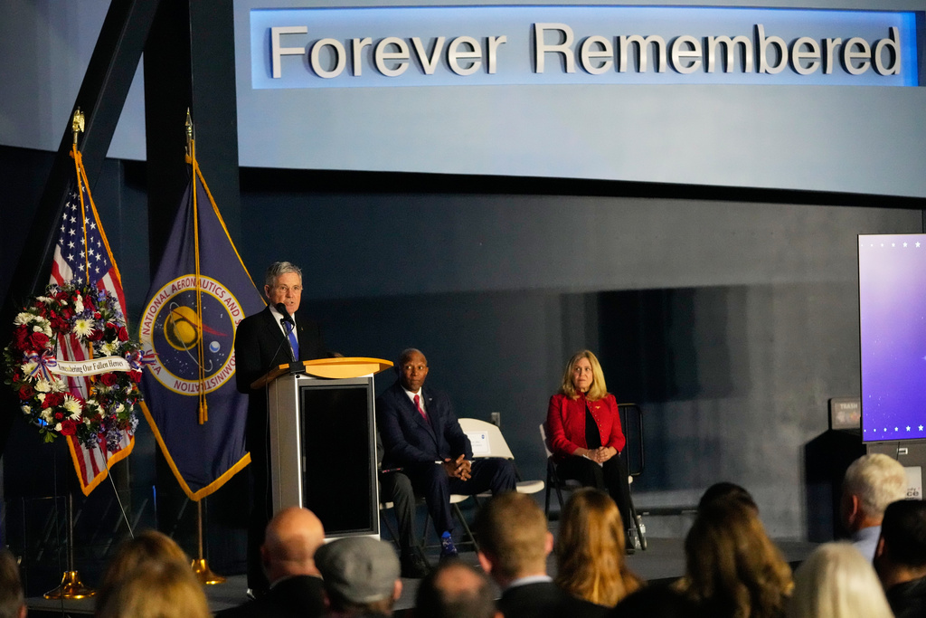 Veteran astronaut, Bob Cabana, left, makes remarks during NASA's Day of Remembrance for the 40th Anniversary of the Challenger tragedy at the Kennedy Space Center Visitor Complex in Cape Canaveral, Fla., Thursday, Jan. 22, 2026. (AP Photo/John Raoux)