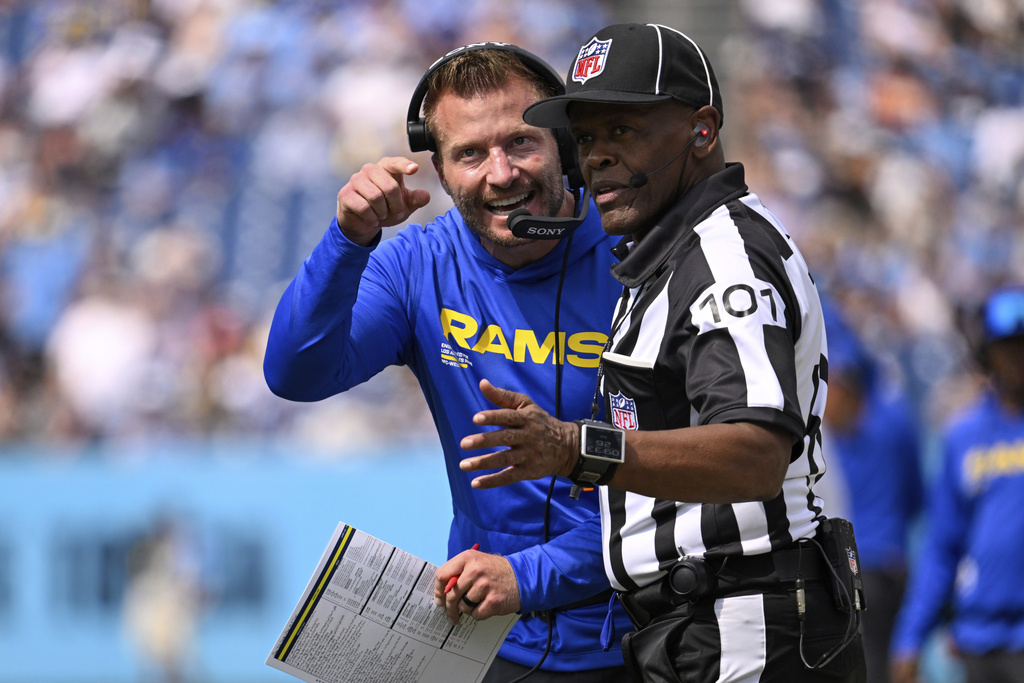 Los Angeles Rams head coach Sean McVay talks with an official during the second half of an NFL football game against the Tennessee Titans, Sunday, Sept. 14, 2025, in Nashville, Tenn. (AP Photo/John Amis)