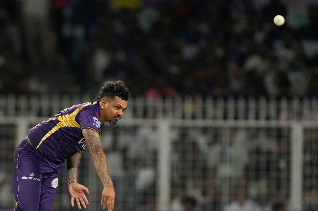Kolkata Knight Riders' Sunil Narine bowls a delivery during the Indian Premier League cricket match between Gujarat Titans and Kolkata Knight Riders, in Kolkata , India, Saturday, May 16, 2026. (AP Photo/Bikas Das)
