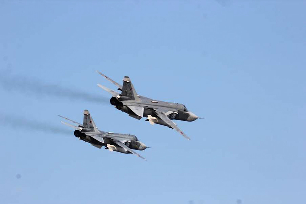 FILE - In this Tuesday, April 12, 2016 photo provided by the U.S. Navy, two Russian Sukhoi Su-24 attack aircraft fly near USS Donald Cook in the Baltic Sea. (U.S. Navy via AP, file)
